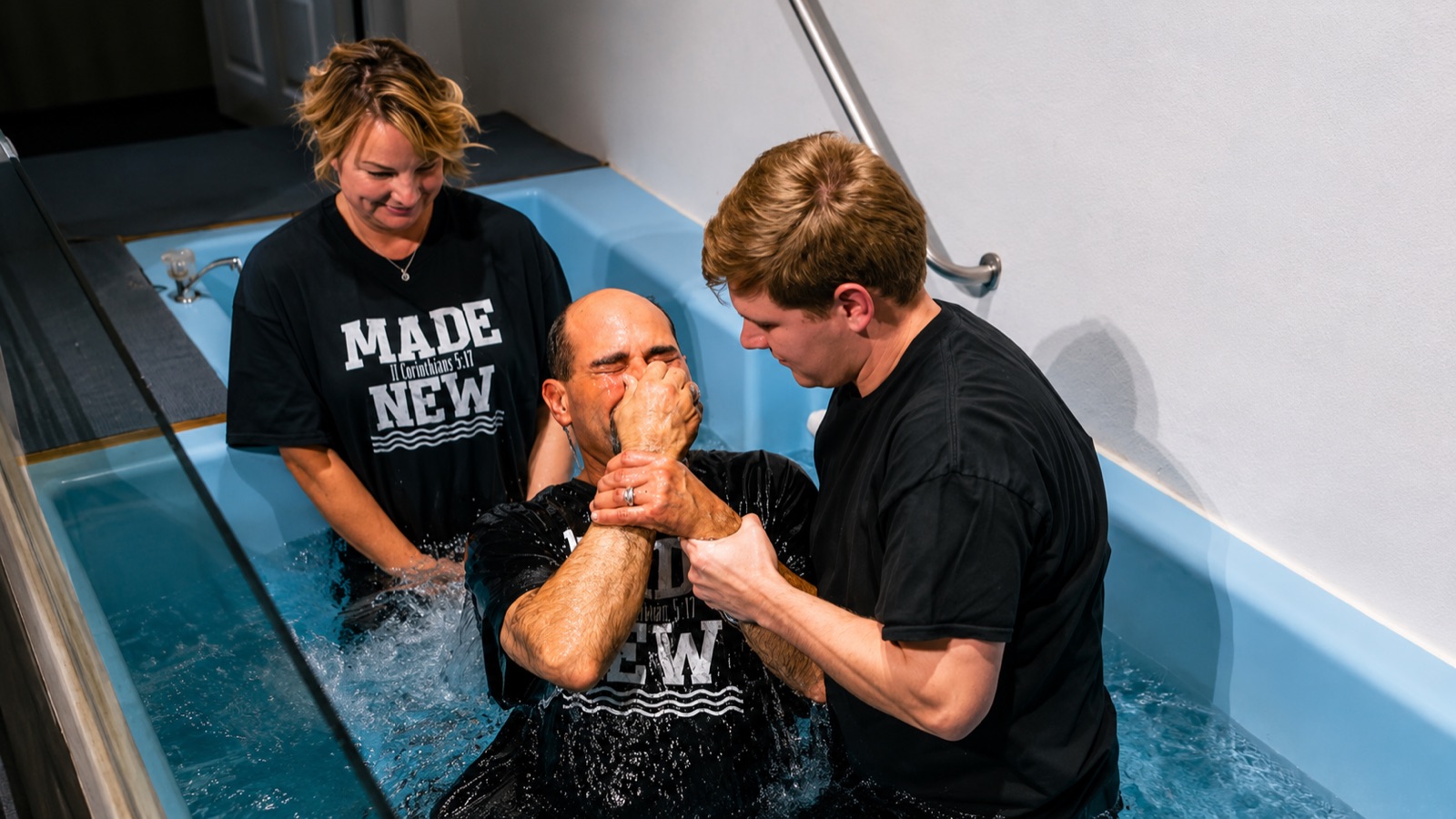 A man being baptized at Fellowship of the Rockies